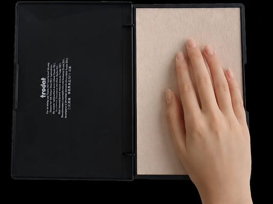 Trodat 9054 large stamp ink pad size comparison with hand
