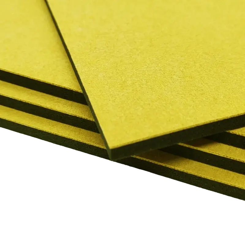 Stack of four sponge foam pads for self-inking stamps, showing yellow textured surface and black base.
