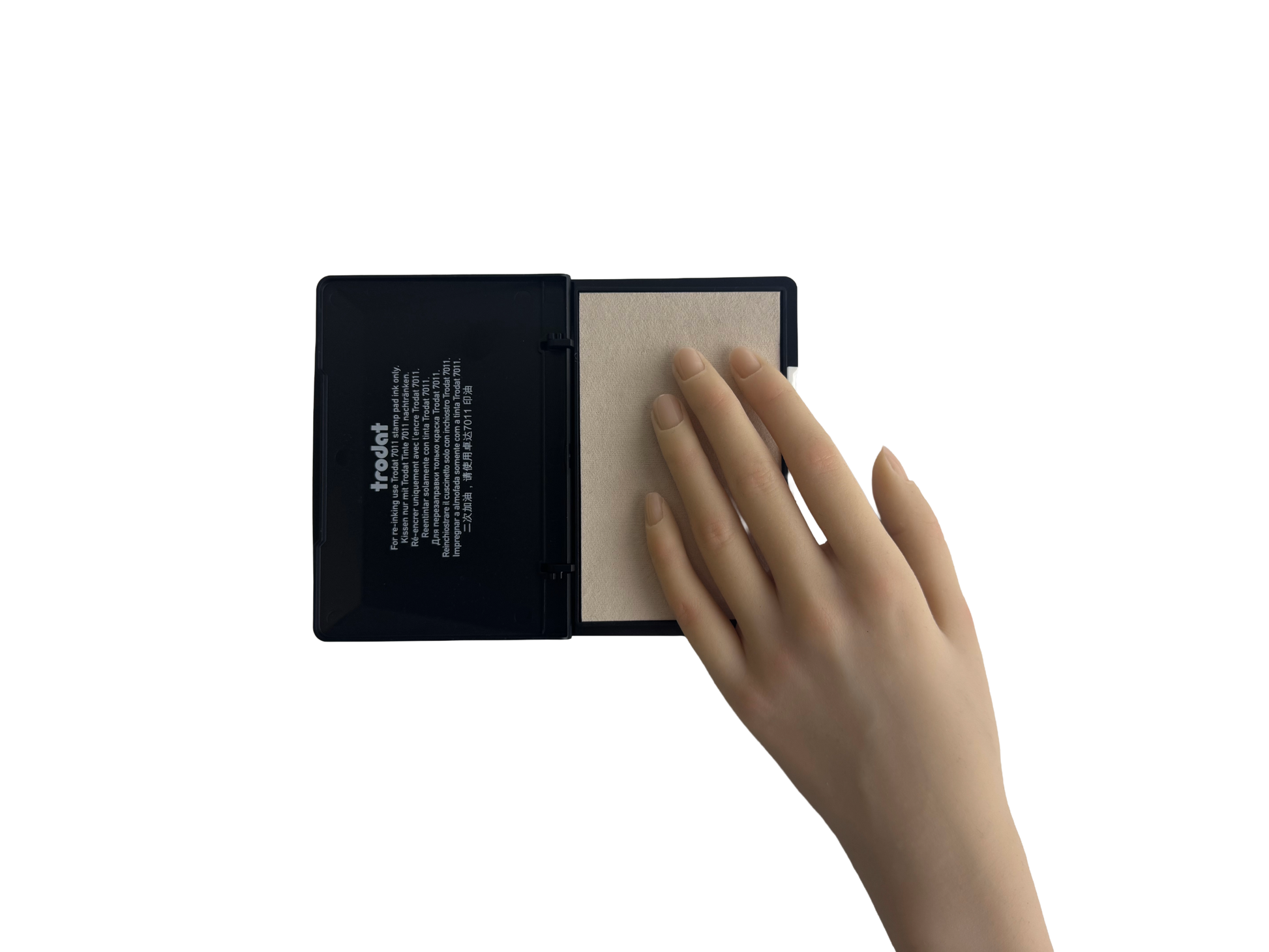 Trodat 9052 ink pad size comparison held in hand