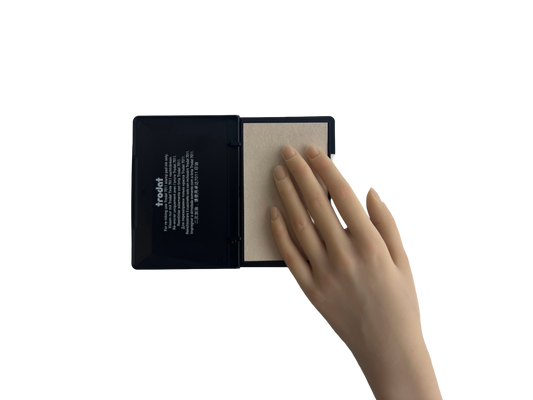 Trodat 9052 ink pad size comparison held in hand